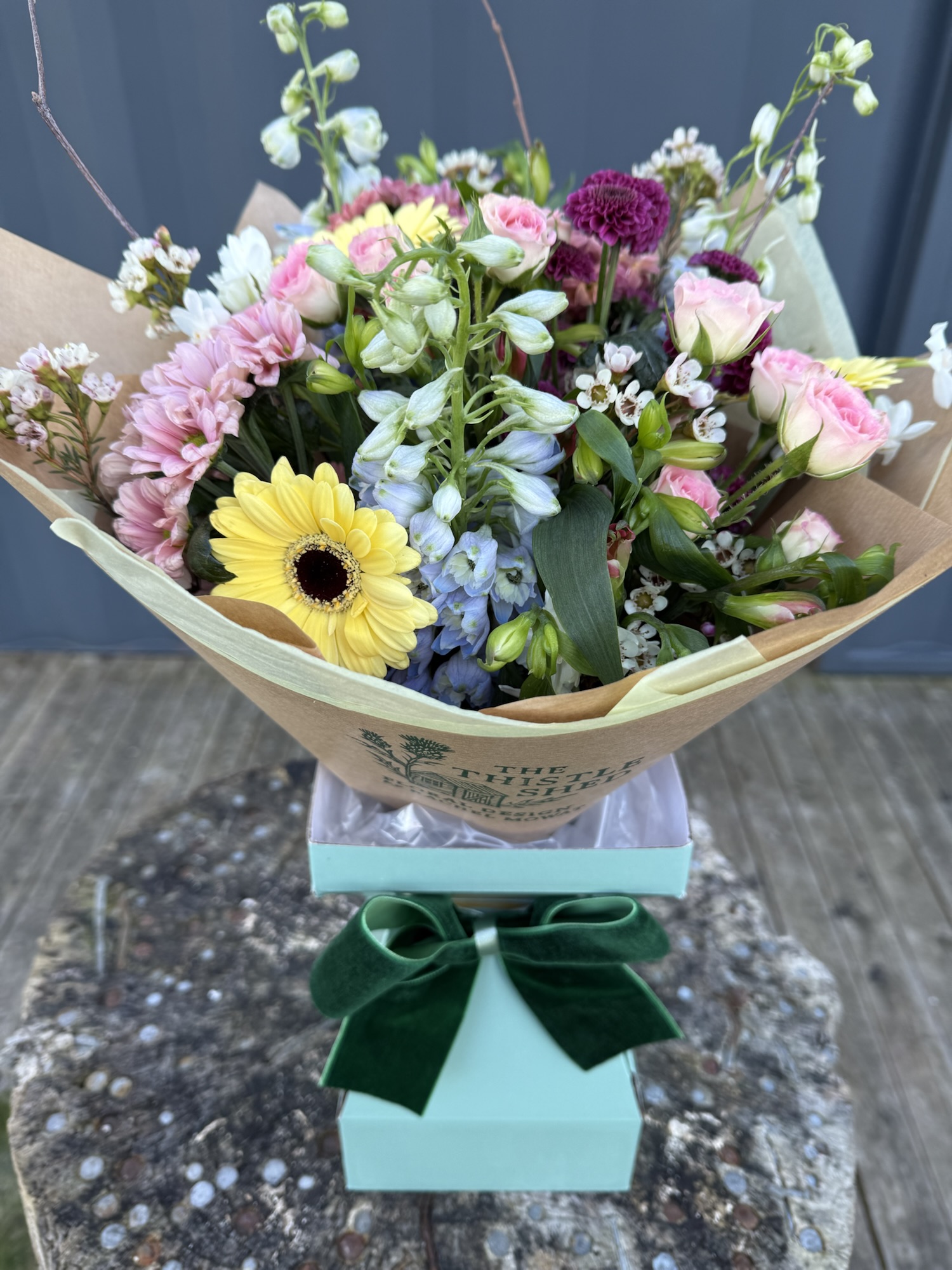 Cottage garden spring bouquet with soft pastel spring flowers arranged in a rustic hand-tied style by a Cupar florist